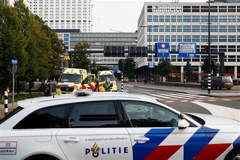 Dutch police say 2 people are killed in shootings at a university hospital and home in Rotterdam
